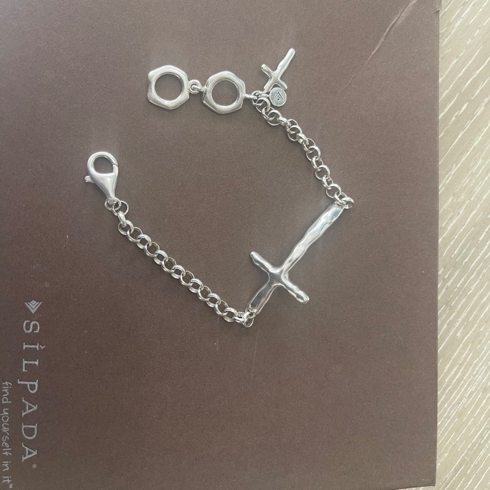 Silpada cross Silver Bracelet. 8 inch adjustable